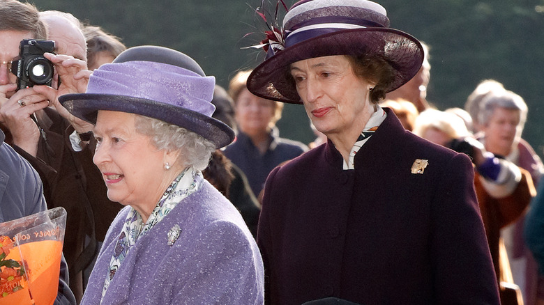 Lady Susan Hussey and Queen Elizabeth II at a walkabout