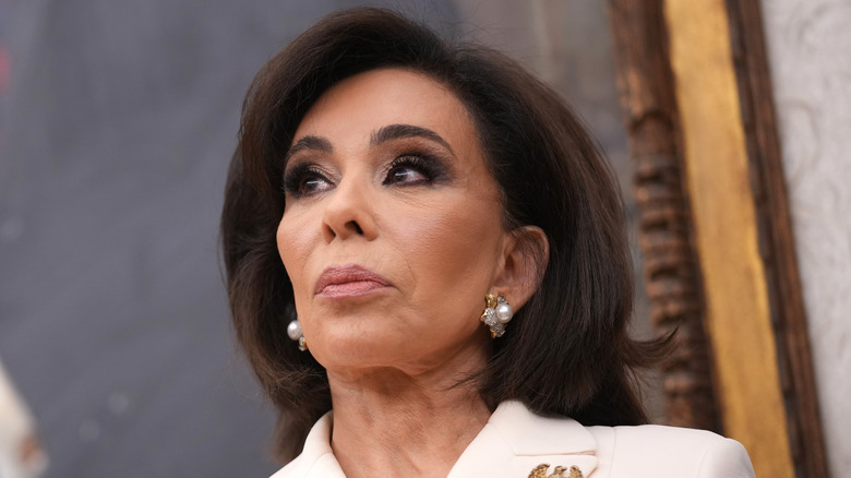 Jeanine Pirro looking to the left