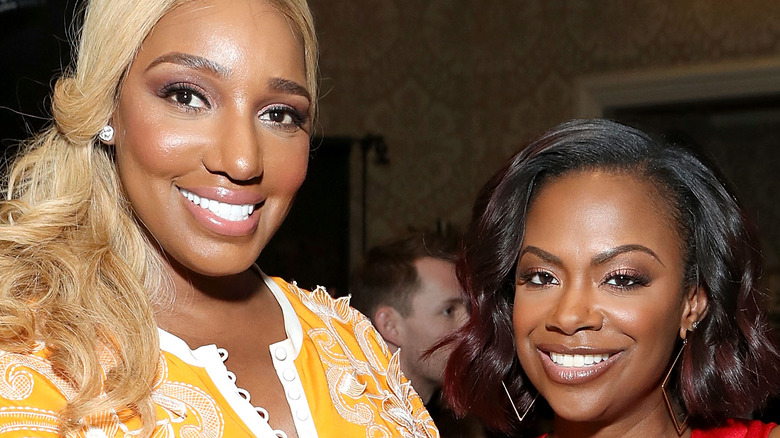 NeNe Leakes poses with Kandi Burruss