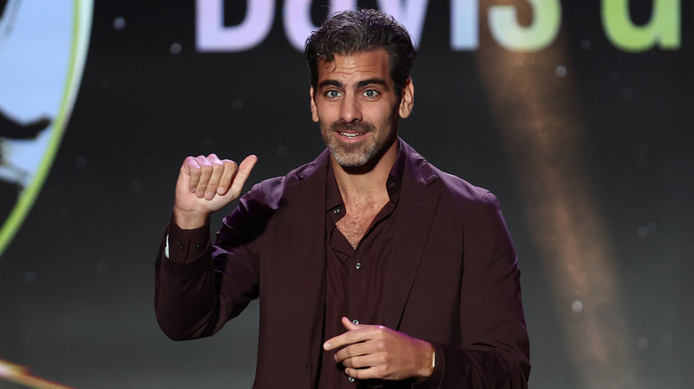 Nyle DiMarco signing in October 2025