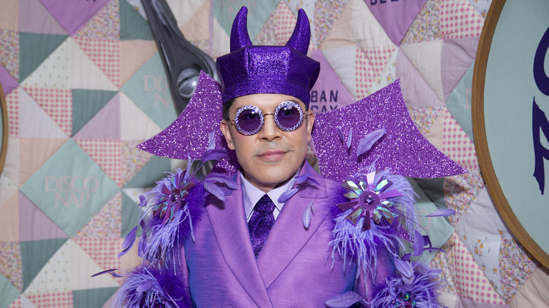 Mondo Guerra wearing head-to-toe purple while attending a Halloween party in 2025.