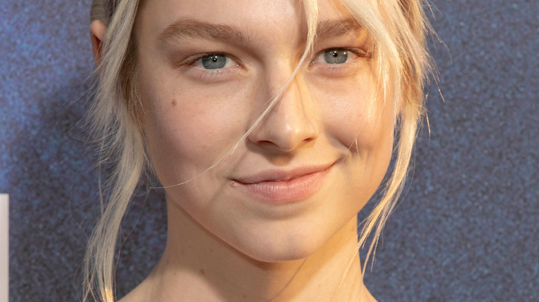 Hunter Schafer smiling for cameras