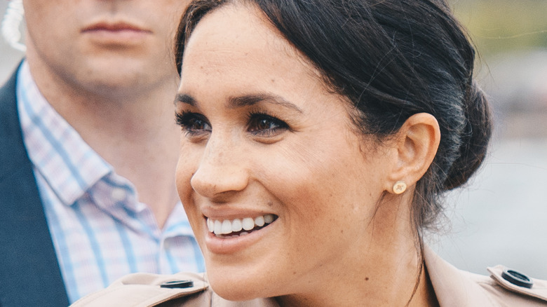 Meghan Markle smiling greeting fans