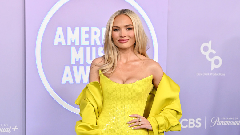 Natalie Alyn Lind posing at the 52nd American Music Awards.