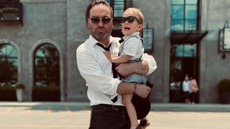 Johnny Galecki and his son Avery wearing sunglasses