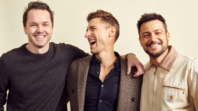 Paul Campbell, Andrew Walker, and Tyler Hynes smiling