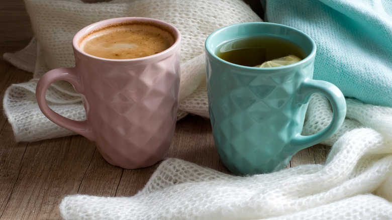 Coffee cup and mug of tea