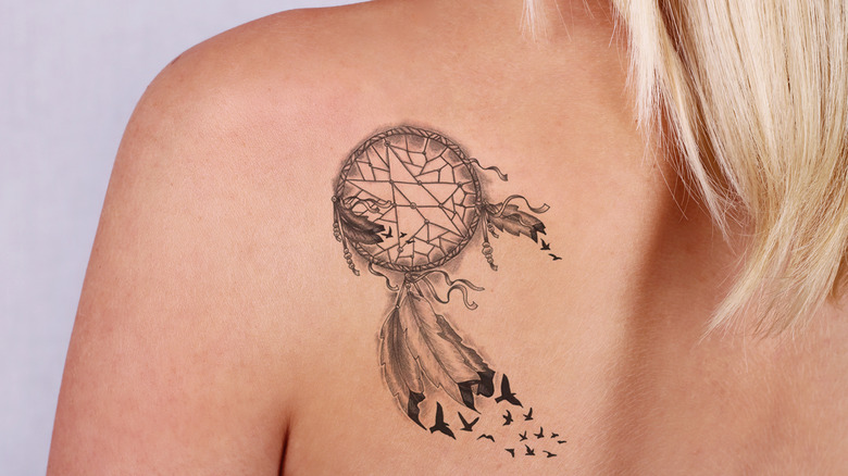 Tattoo on woman's back