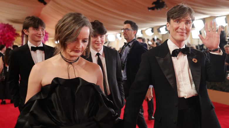 Yvonne McGuinness and Cillian Murphy arrive at the 2024 Oscars with their sons
