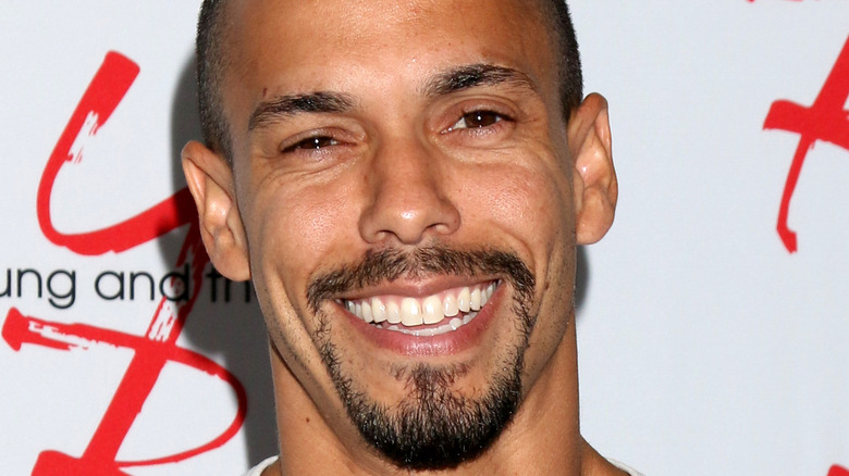 Bryton James smiling