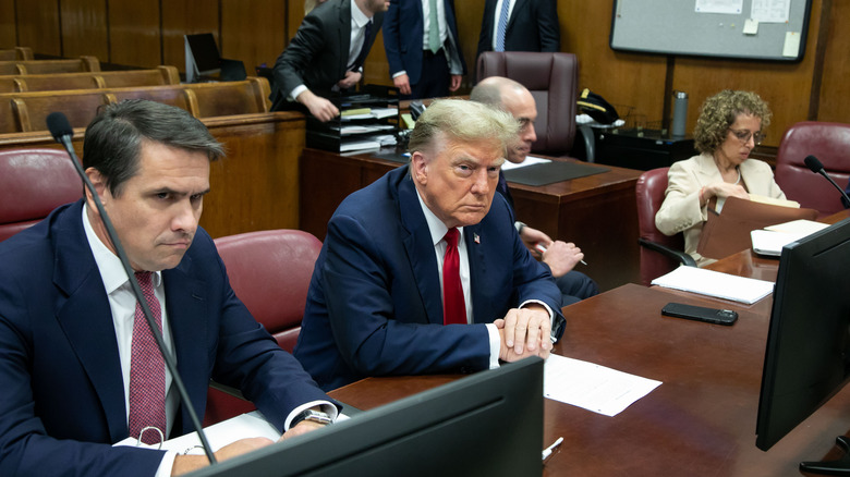 Todd Blanche, Donald Trump, and Susan Necheles seated in court