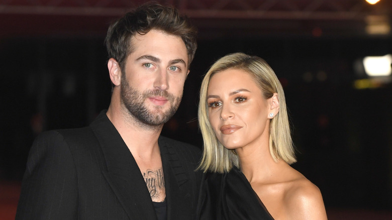 Morgan Stewart and Jordan McGraw attending a Los Angeles red carpet event in 2023