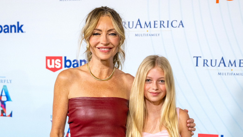 Rebecca Gayheart posing with Georgia Dane