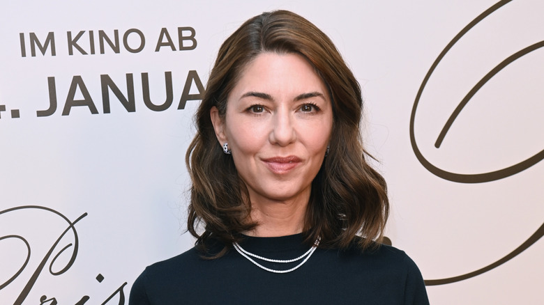 Sofia Coppola in front of white and black backdrop