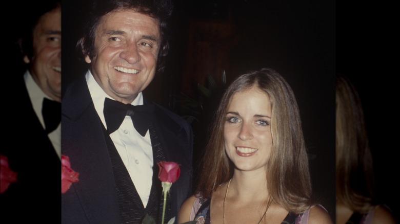 Johnny Cash and Carlene Carter attending an event in the '70s