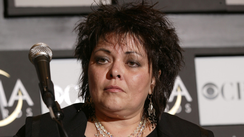 Kathy Cash at the CMA Awards, accepting her father's award for "American IV: The Man Comes Around"