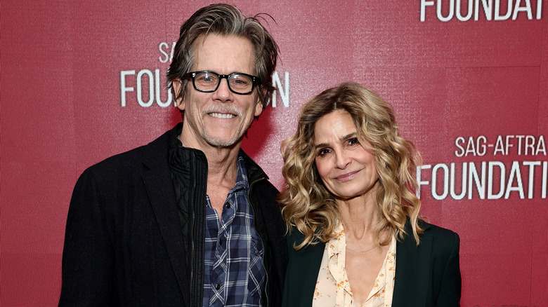 Kevin Bacon and Kyra Sedgwick posing 