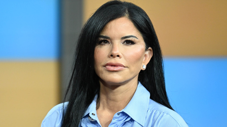 Lauren Sanchez wearing light blue collared shirt