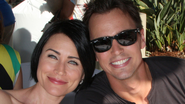 Rena Sofer and Darin Brooks smiling