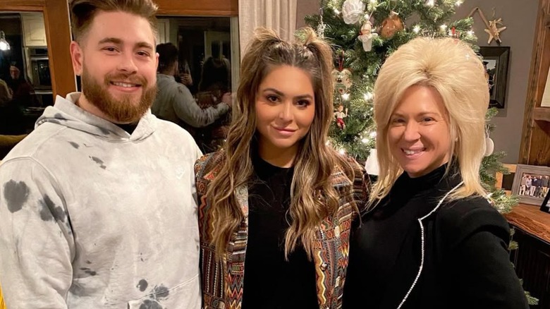 Larry Jr. Caputo, Victoria Caputo, and Theresa Caputo smiling