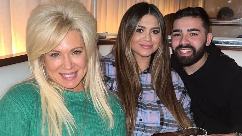 Michael Mastrandrea, Victoria Caputo, and Theresa Caputo smiling