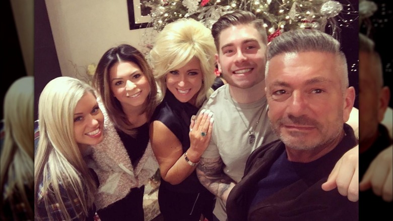 Leah Munch, Larry Caputo, Victoria Caputo, Theresa Caputo, and Larry Caputo Jr. smiling