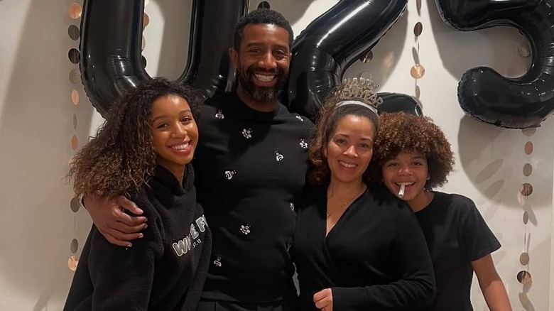 Andre Johnson with his wife and two kids.