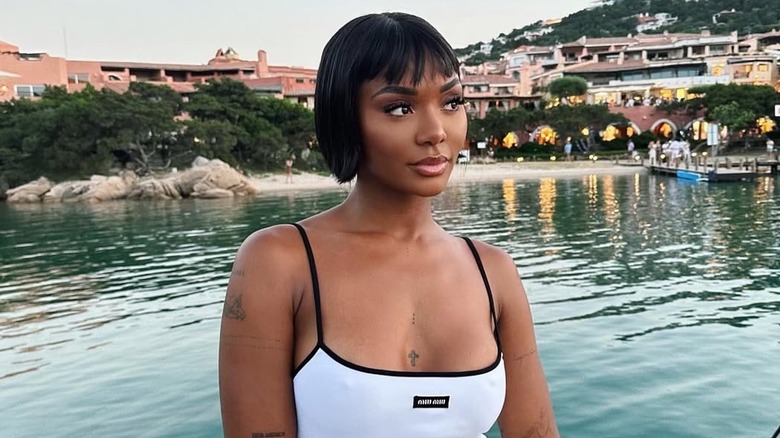 Elisa Johnson poses by the waterfront.