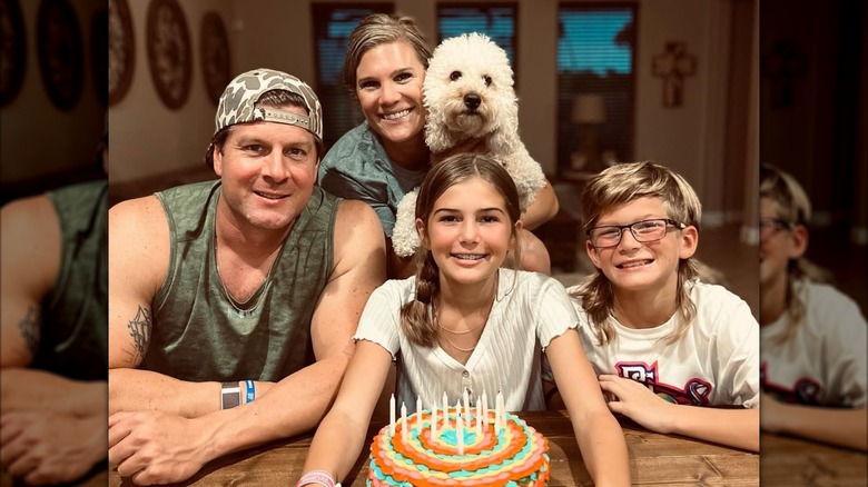 Dale, Crystal, McKenzie, and Bronson Mills smiling