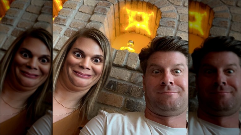 Dale and Crystal Mills smiling with a filter on