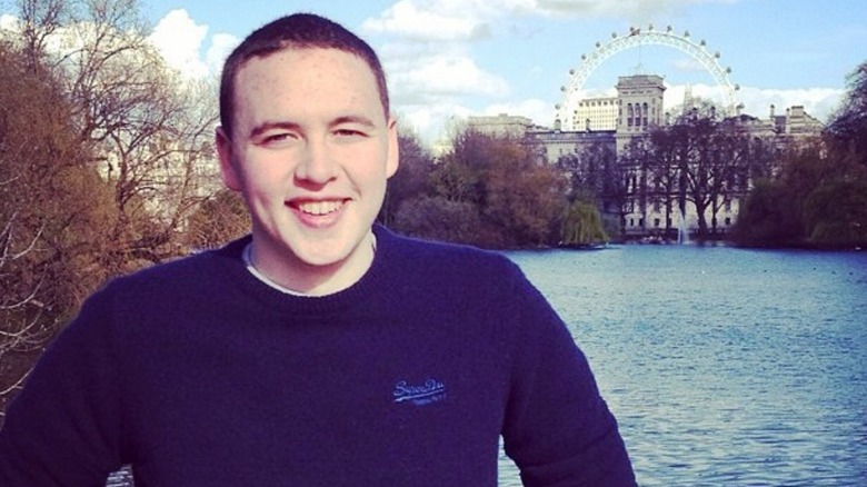 Christian Mowatt smiling with London and the River Thames in the background