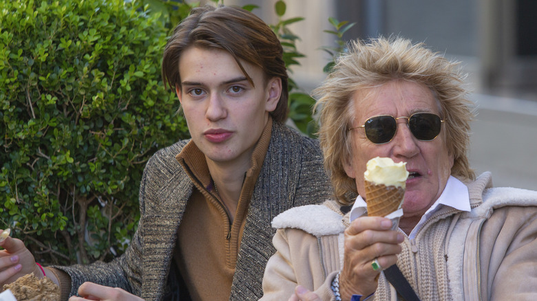 Alastair Stewart eating ice cream with Rod Stewart