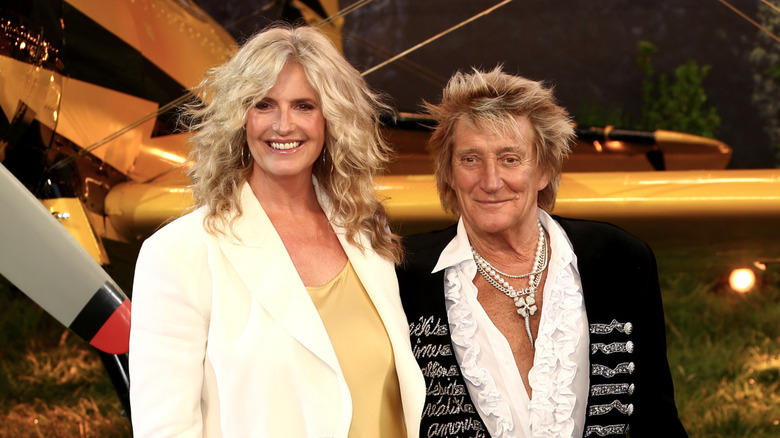 Rod Stewart posing with wife Penny Lancaster