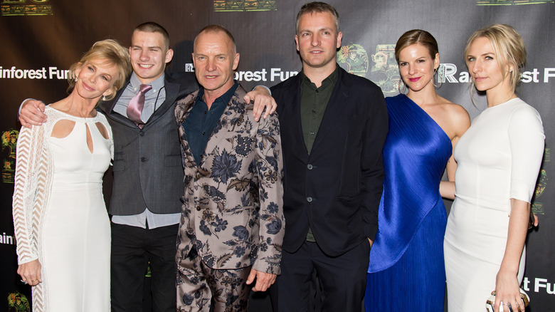 Sting posing at an event with wife Trudie and four of his children