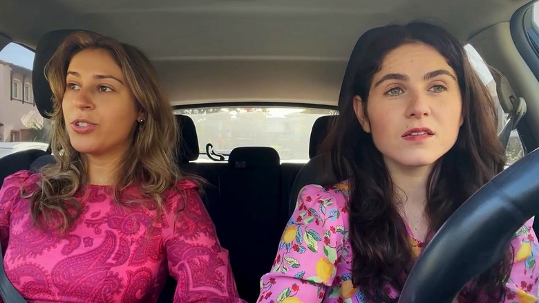 Screenshot of Emily McEnroe in a car from the short film "Hi Mom" (2023)