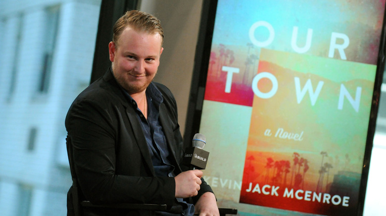 Kevin McEnroe promoting his book on set