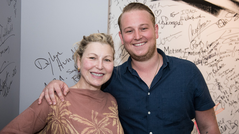 Kevin McEnroe smiling with Tatum O'Neal in 2015