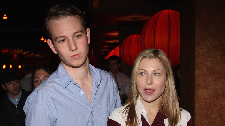 A younger Sean McEnroe with his mom Tatum O'Neal at an event