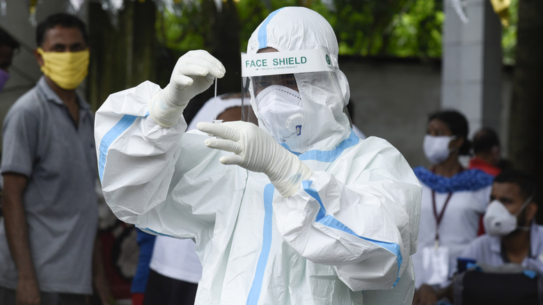 Health worker in hazmat suit in India during the COVID pandemic