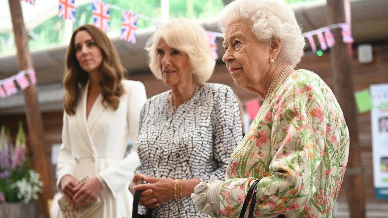 Kate Middleton, Camilla, and Queen Elizabeth standing together