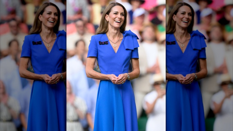 Princess Catherine in blue dress with v-neck and pleated skirt