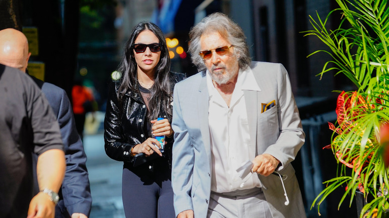 Noor Alfallah and Al Pacino taking a walk
