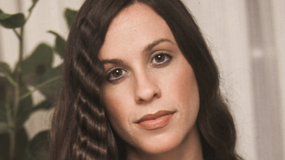 Alanis Morissette posing