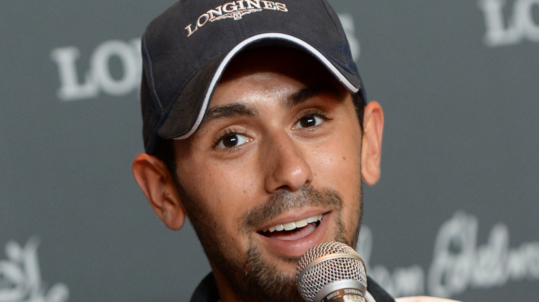 Close-up of Nayel Nassar speaking into a microphone