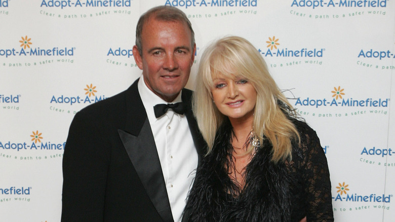 Bonnie Tyler and husband Robert Sullivan posing