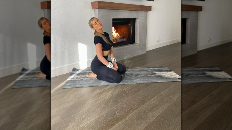 Brittany Williams posing while doing Pilates
