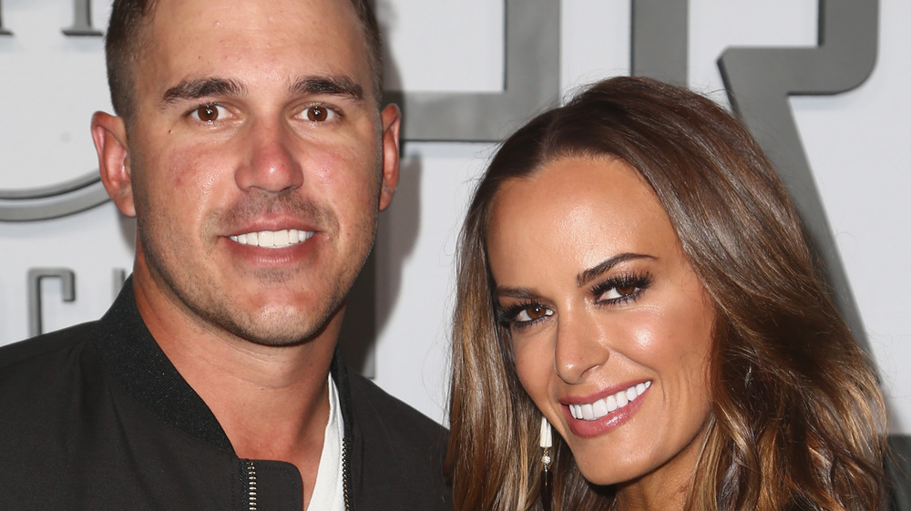 Brooks Koepka and Jena Sims at event