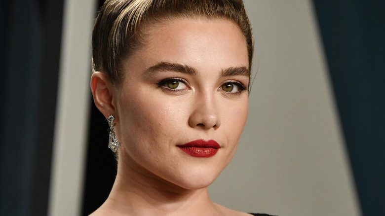 Florence Pugh posing for photographs