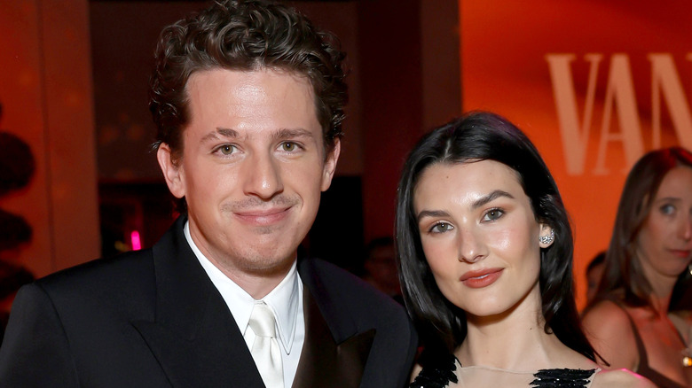 Charlie Puth and Brooke Sansone posing for a photo