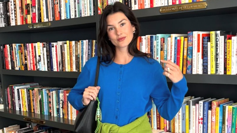 Brooke Sansone posing in a bookstore